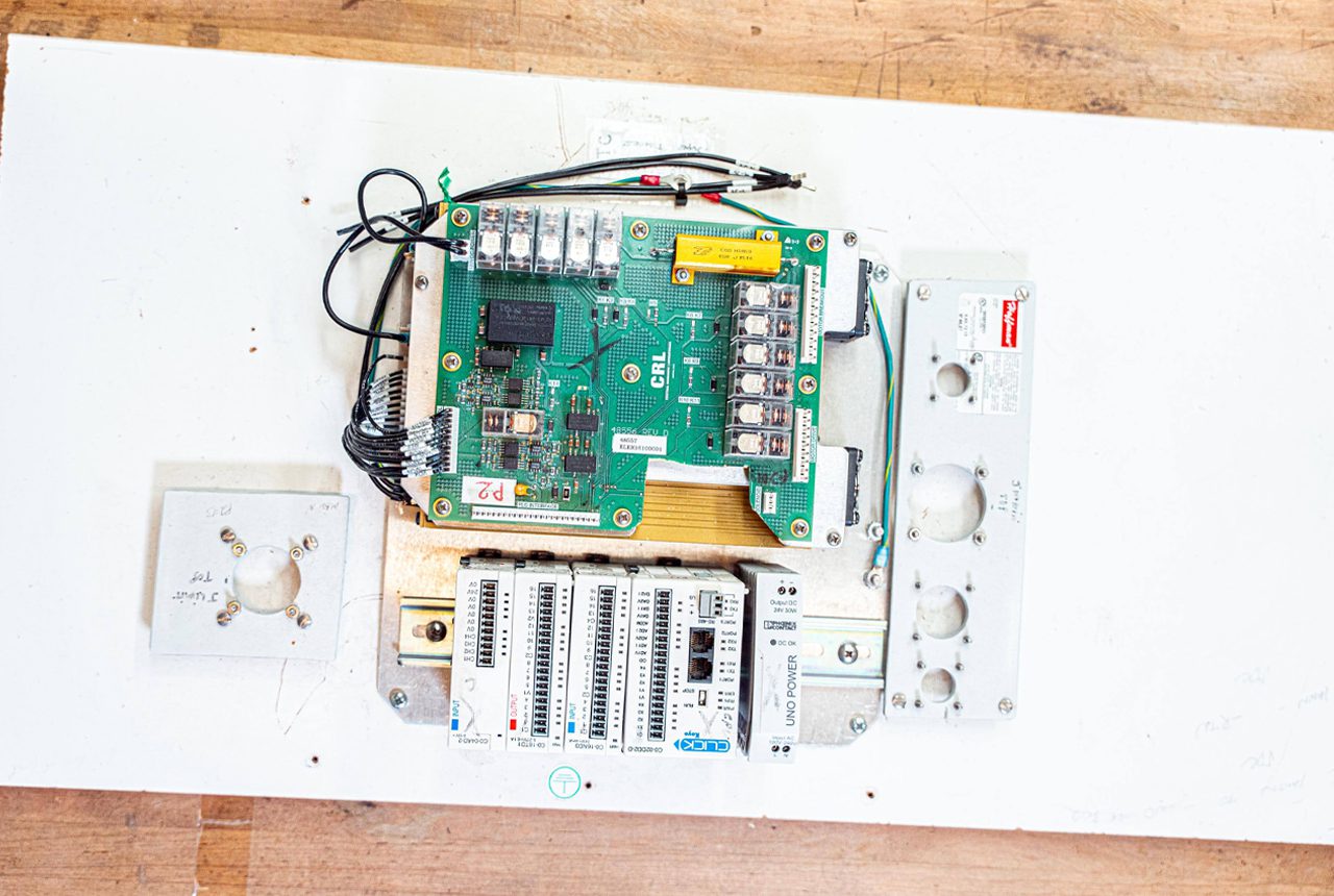 Looking down a cable assembly box.